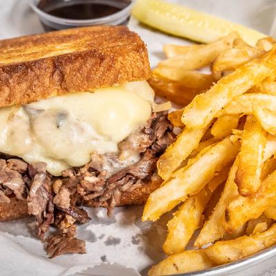 Dixie Pig French Dip sandwich with a side of fries