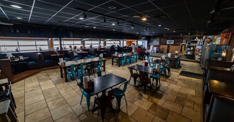 Interior space, dining area, tables, chairs and booths