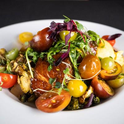 Short Smoked Salmon with polenta, brussels sprouts, tomatoes, and honey-roasted beets.