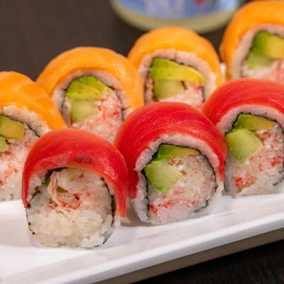 Rainbow sushi rolls, close-up.