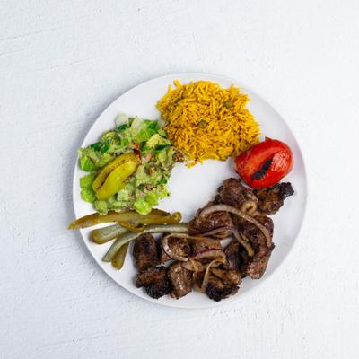 Spiced grilled lamb, with rice and veggies.