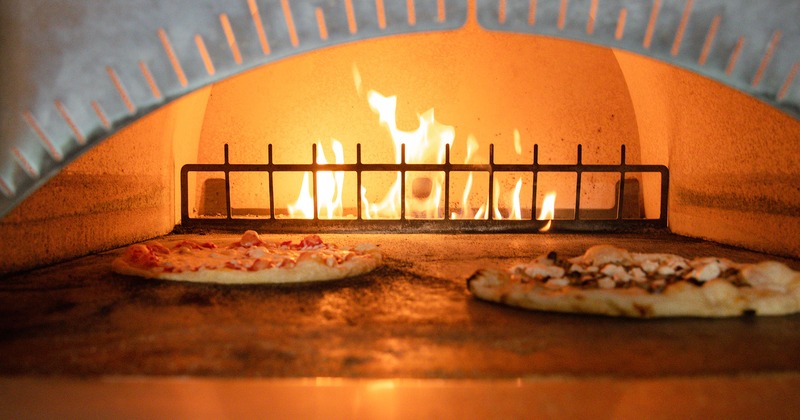 Pizzas in pizza oven