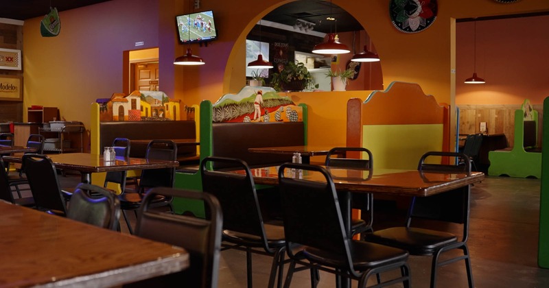 Interior, dining area, tables with chairs, seating booths, ready for guests, concrete flooring