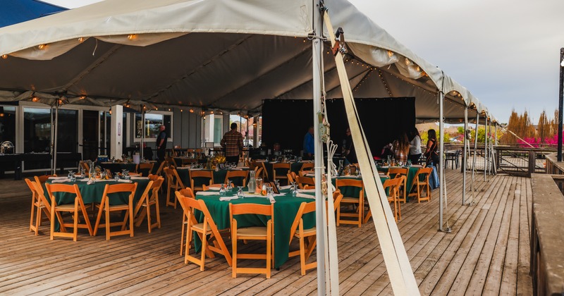 Exterior,  patio, tent, tables and chairs under