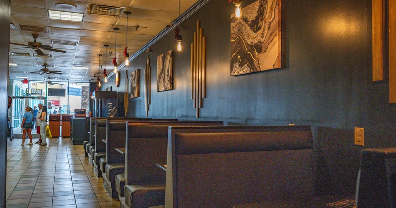 Interior, seating area with boots along the wall