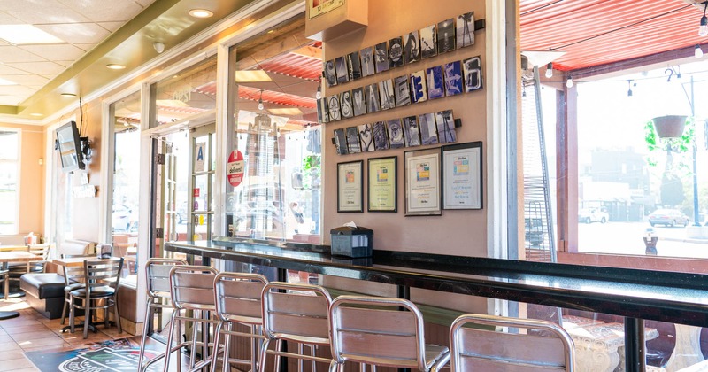 Interior, diner area, bar table, chairs