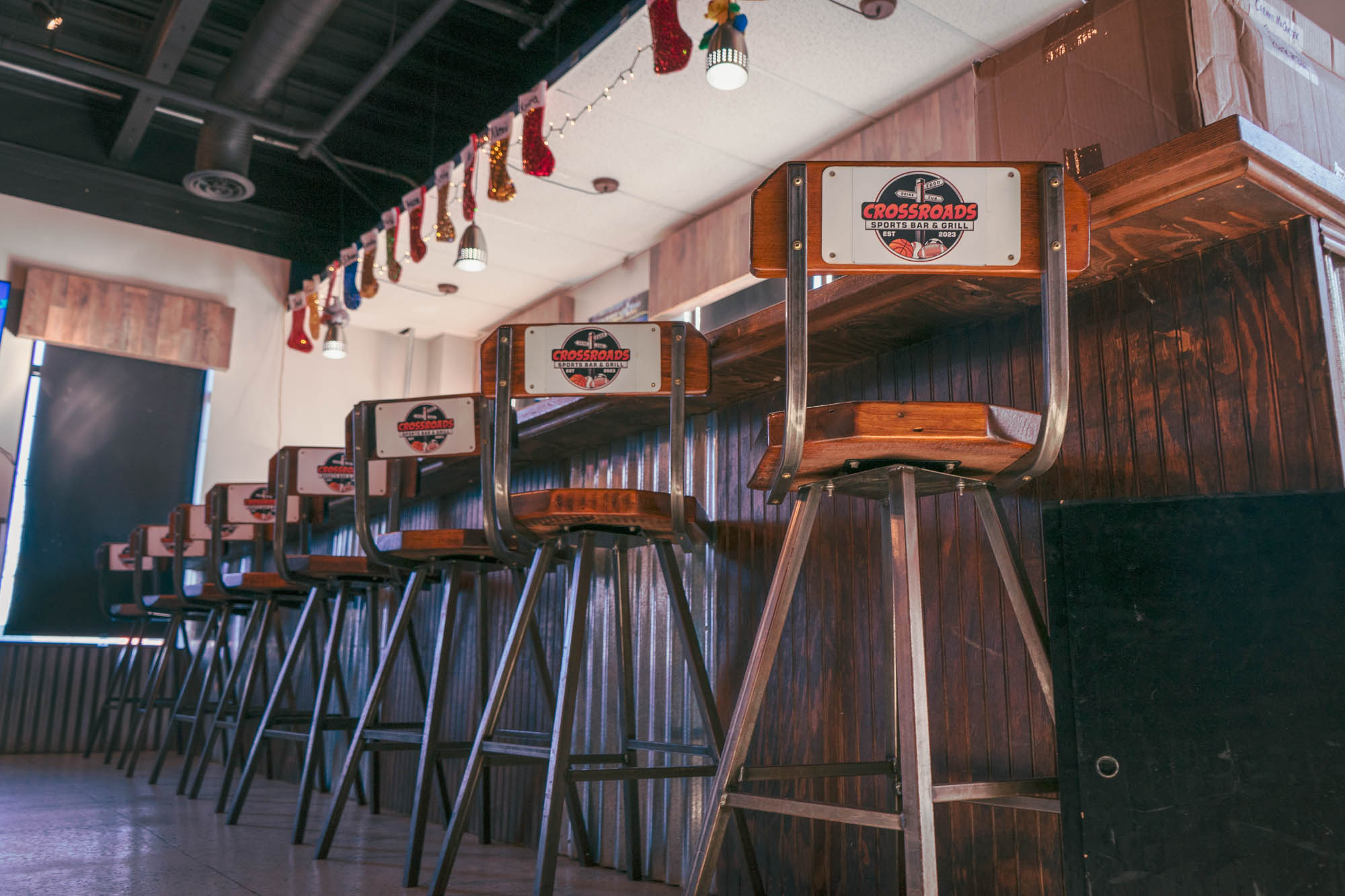 A low angle view of a line of bar stools