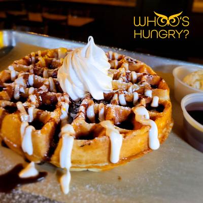 Waflle with sweet cheese, hazelnut Spread and whipped cream.