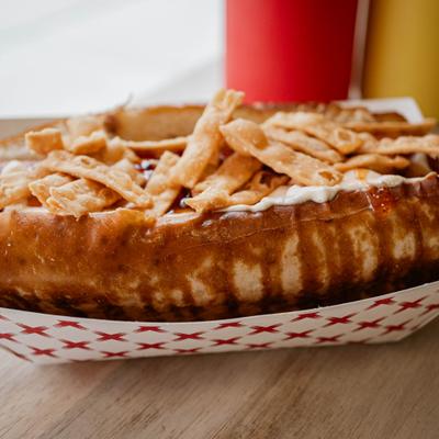 Crab Rangoon Dawg served on the table.