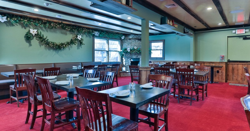 Interior of a restaurant with dark wooden furniture