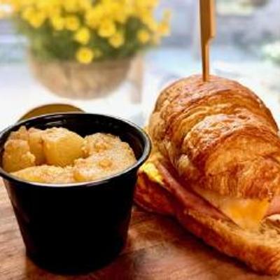 Breakfast Sandwich Black forest ham, Colby Jack cheese, cage-free organic eggs, and a buttery croissant.