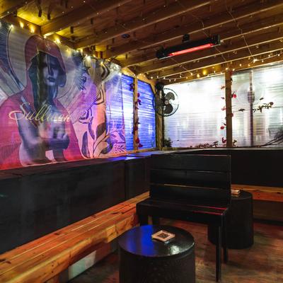 Interior, area with seating and mural art