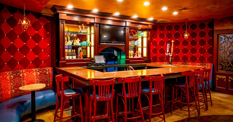 Interior, bar, bar stools, drink behind, tv above