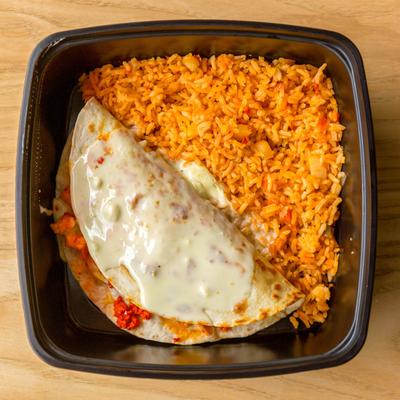 Quesadilla with rice and cheese sauce, top view.