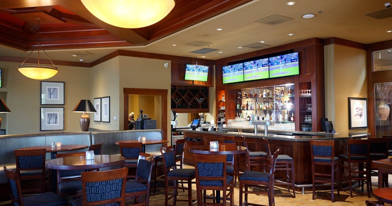 Interior, seating area with a bar in the back