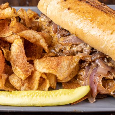 Served steak sandwich.
