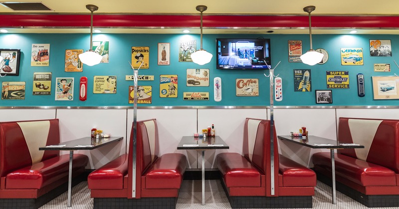 1950s-style restaurant interior, seating area, dining booths