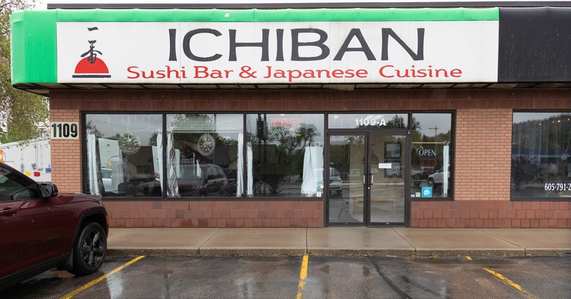 Exterior, front view to restaurant, entrance, sign