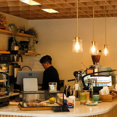 A staff member behind the counter.