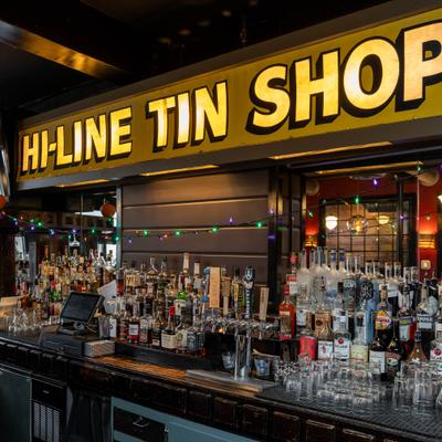 Various liquor bottles, glasses, and beer taps.