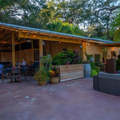 Exterior space with patio cover, seating area.