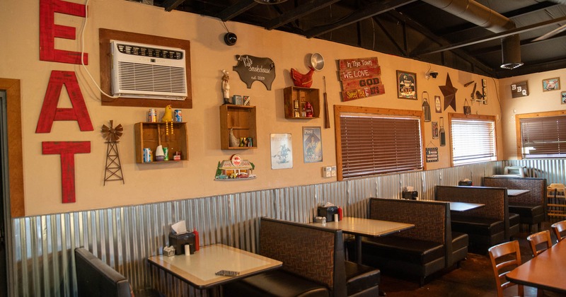 Interior, dining booths near wall