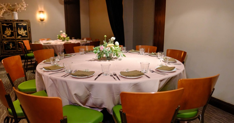 Interior, round table set for guests