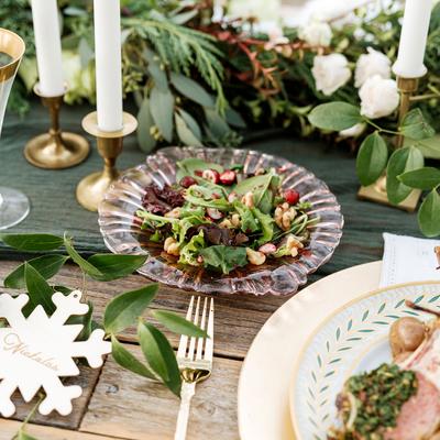 Christmas shoot, a mixed green salad served on a decorated table