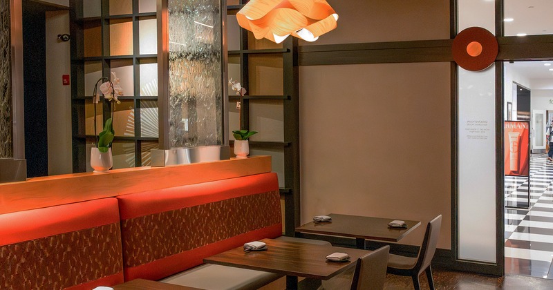 Nicely done interior dining area with tables ready for guests