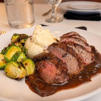 Steak Demi Glace with brussels sprouts, and garlic mashed potatoes.