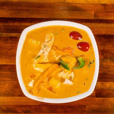 Mango curry with vegetables, top view