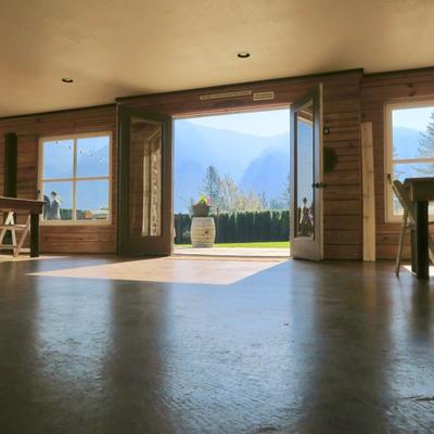 Restaurant interior with doors opened in the back