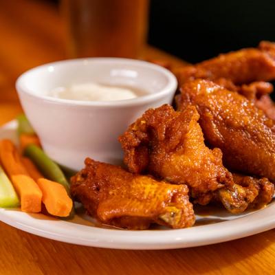 Chicken wings served with bleu cheese dressing, celery and carrot sticks.