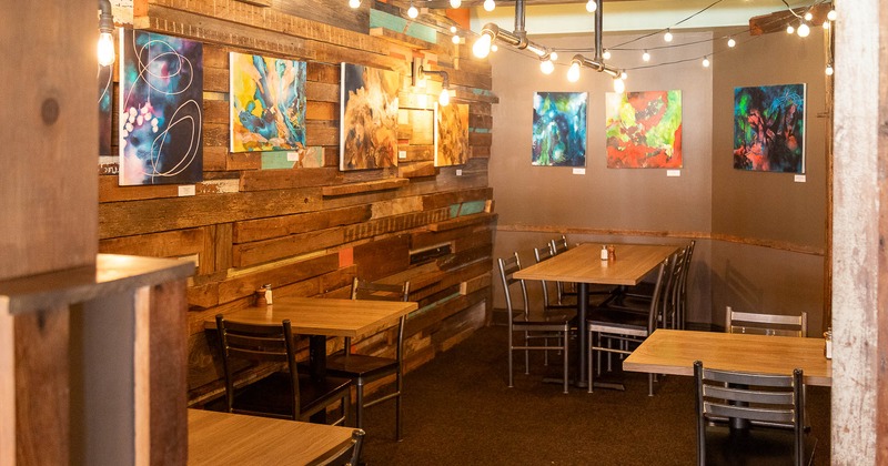 Dining area decorated with pictures on the wall