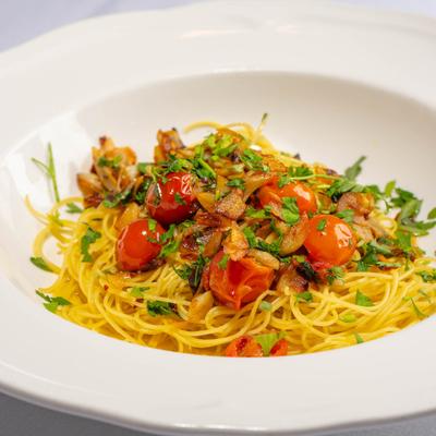 Angel hair pasta, with  EVOO, garlic, cherry tomatoes, parsley, and red pepper flakes.