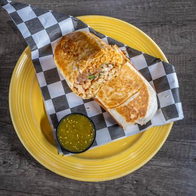 Loco Burrito with green salsa, top view.