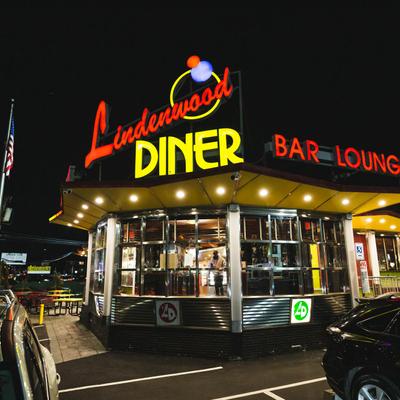 Exterior, parking lot and seating area, night
