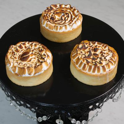 Tangy lemon curd, topped with a flamed meringue in a shortbread crust