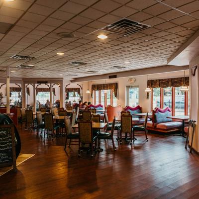 The restaurant's interior, tables and chairs.