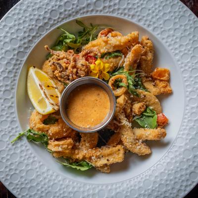 Calamari with a dipping sauce.