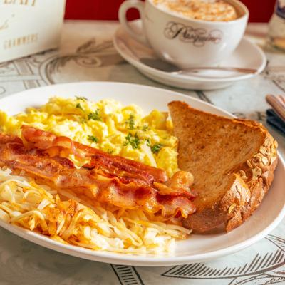 Breakfast Special Platter with scrambled eggs, bacon, hash browns and toast.