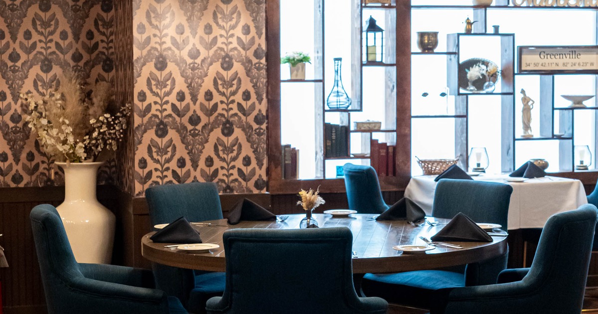 Interior, tables and chairs ready for guests