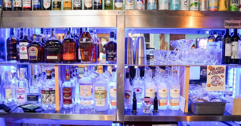 Numerous bottles on shelves