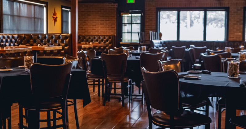 Interior, tables and chairs ready for guests