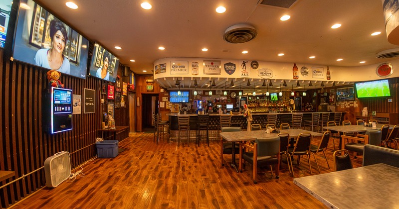 Dining area, TVs on the walls