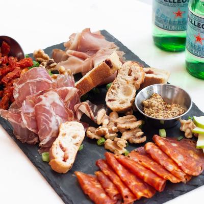 Cold cut platter with bread.