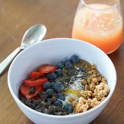 Breakfast bowl served with a cocktail.