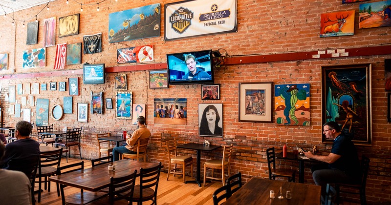 Interior, tables and chairs, pictures on the wall