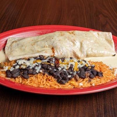 Burrito Grande Fajitas served with rice and black beans.