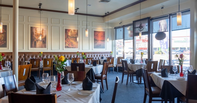 Interior, tables and chairs ready for guests
